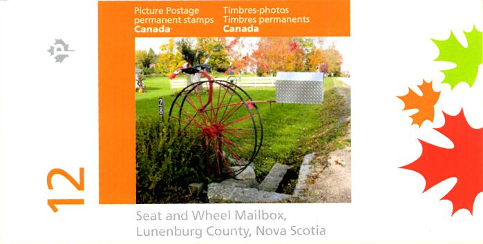 Booklet of Picture Postage stamps showing folk art mailbox with seat and wheel and mailbox