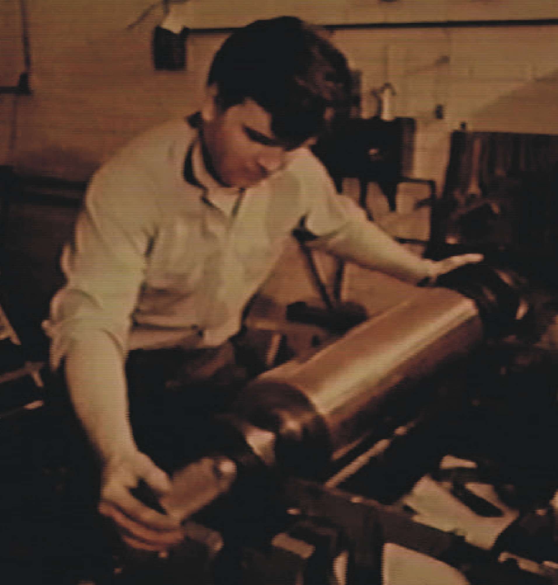 Stirling McElerhan
                        prepares one of the gravure cylinders for the 1970 6 cent Kelsey commemorative