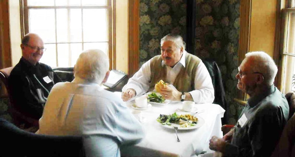 Clockwise around the table: Ken Lemke,
                Derek Smith, Paul Sneyd, Colin Pomfret