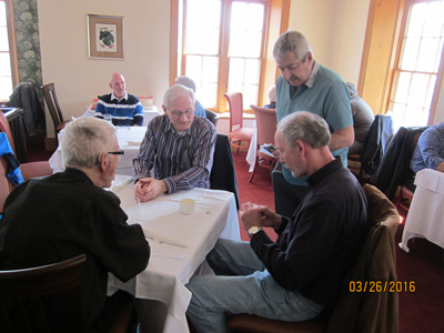 John Irvine (left), Bob Anderson, Bob Vogel (standing),
                Nick Poppenk