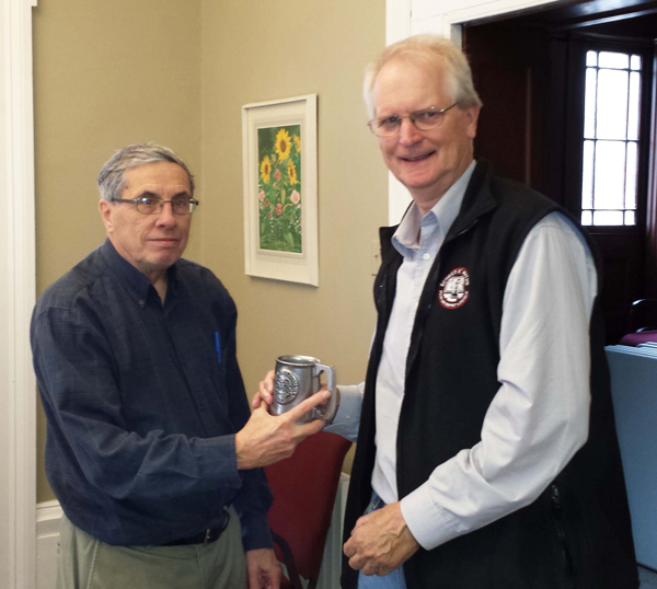 Robert Lemire presents Chris Hargreaves with the Vincent G. Greene award for best article
                     in BNA Topics